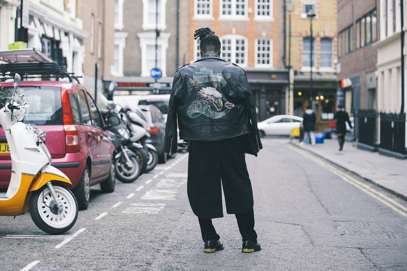 rear view, man, one person, standing, guy, incidental people, leather, male, city, lifestyles, waiting, casual clothing, real people, scooter, style, bokeh