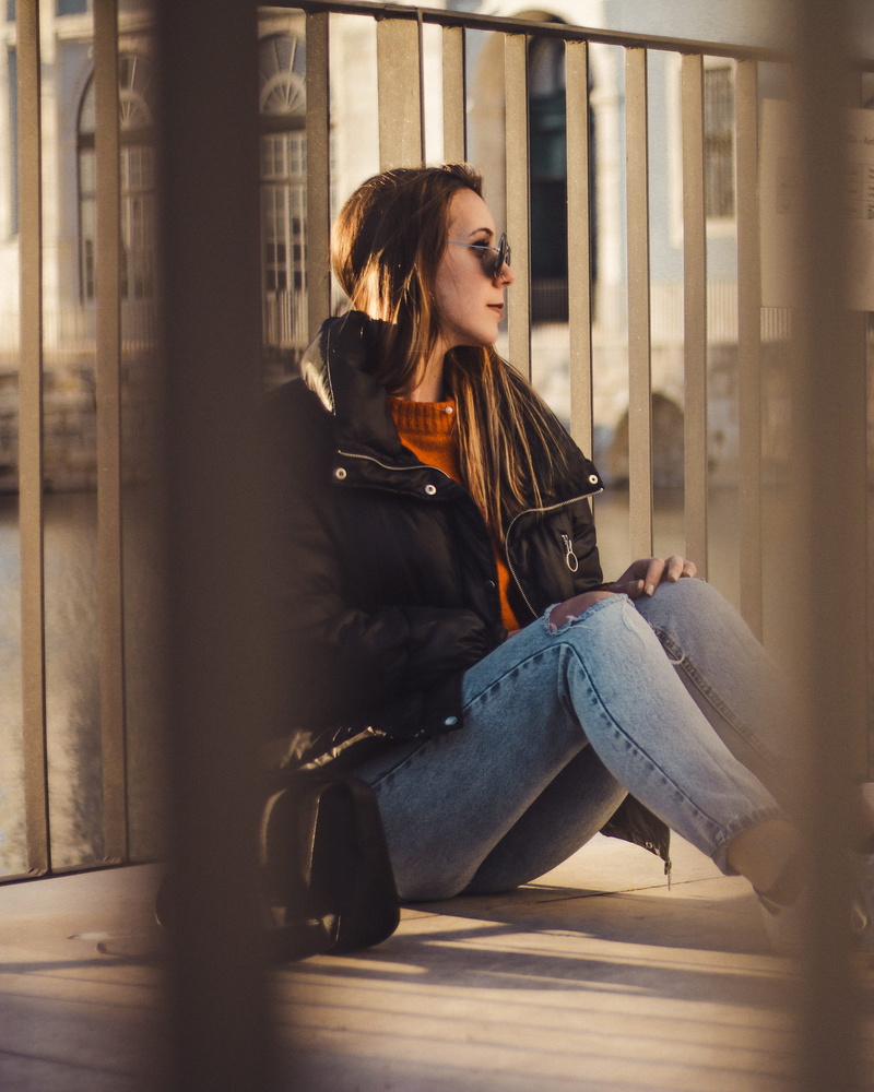 lifestyles, architecture, riding boot, brunette, casual clothing, people, person, clothing, women, young adult, bokeh, boot, beside, sunglasses, leisure activity