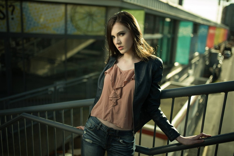 jacket, long hair, one person, focus on foreground, leather jacket, standing, women, hair, depth of field, lifestyles, leather jackets, contemplation, real people