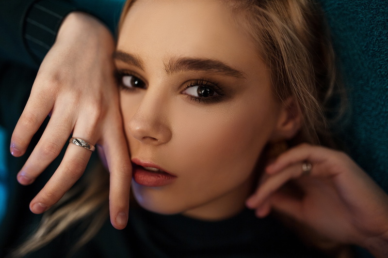hands, rings, model, women indoors, portrait, closeup, face, brown eyes, touching face, Vlad Popov, 2K, indoors, blonde, looking at viewer, bokeh, women