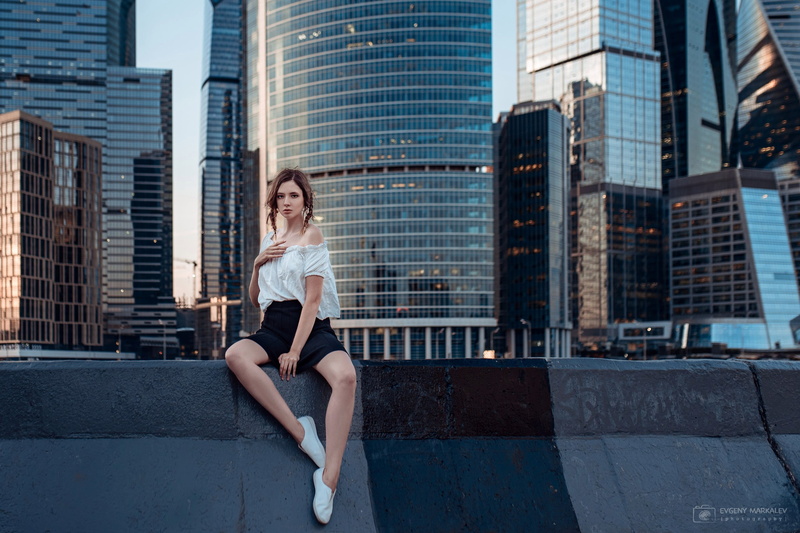 young women, building, brunette, one person, beautiful woman, skirt, lifestyles, office building exterior, building exterior, built structure, legs, sitting