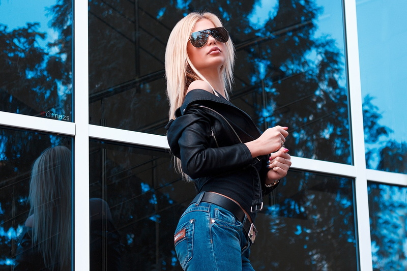 blonde, glasses, focus on foreground, adult, portrait, sunglasses, young adult, leather jackets, three quarter length, hairstyle, females, real people