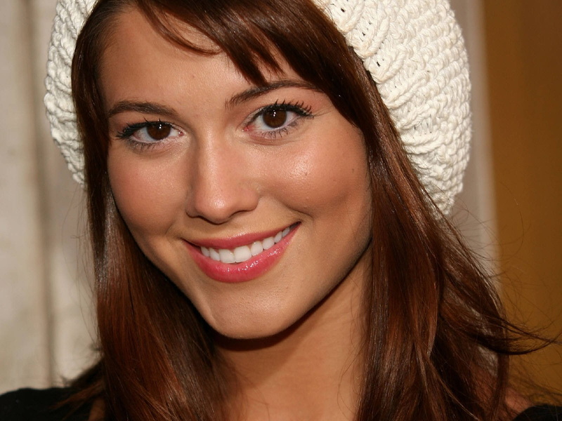 Mary Elizabeth Winstead, one person, adult, brown hair, smiling, hair, looking at camera, human face, headshot, teenager, knit hat, young adult, brown eyes