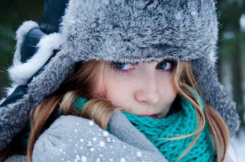 millinery, gloves, day, knit hat, contemplation, real people, headshot, cold temperature, long hair, glove, women, fur, portrait, clothing, blue eyes, winter