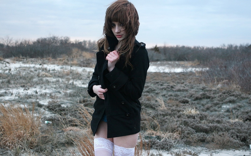 outdoors, lips, lifestyles, young women, nature, real people, cold temperature, front view, long hair, plant, clothing, leisure activity, hair, eyes, winter