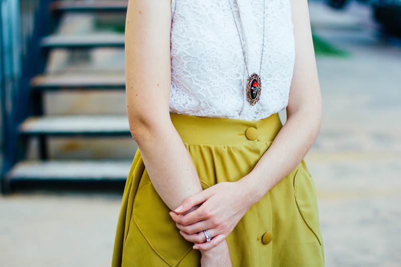 style, wears, yellow, top, fashion, leisure activity, white, sleeved, gem, stone, necklace, midsection, red, shirt, day, women, skirt, pendant, hand, floral