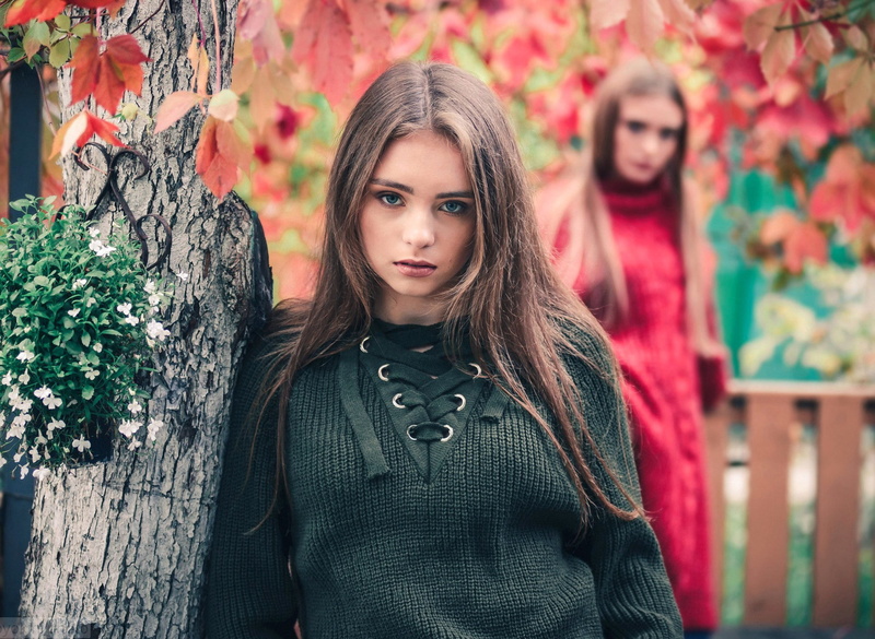 front view, waist up, standing, blue eyes, one person, young women, hair, beautiful woman, grey sweater, teenager, focus on foreground, women, contemplation