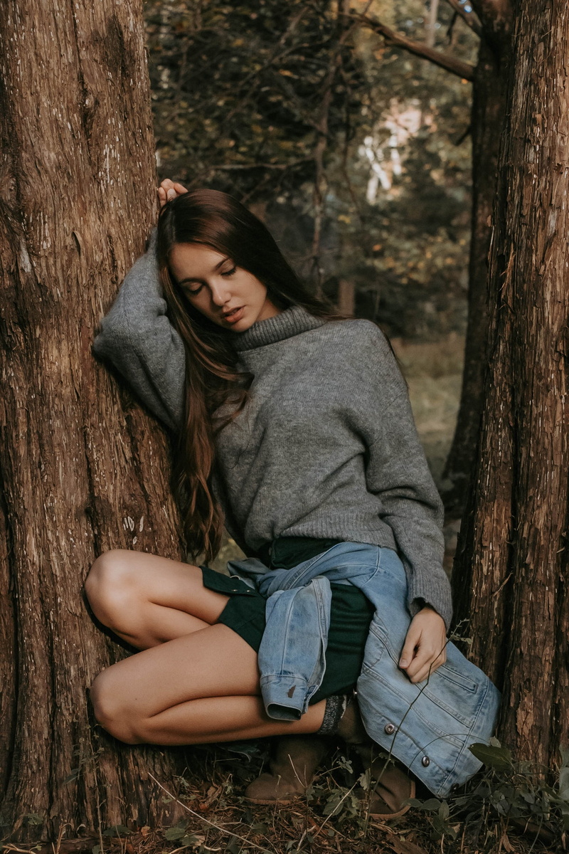 young women, outdoors, trunk, social issues, long hair, teenager, sitting, casual clothing, women outdoors, lifestyles, one person, leisure activity, closed eyes