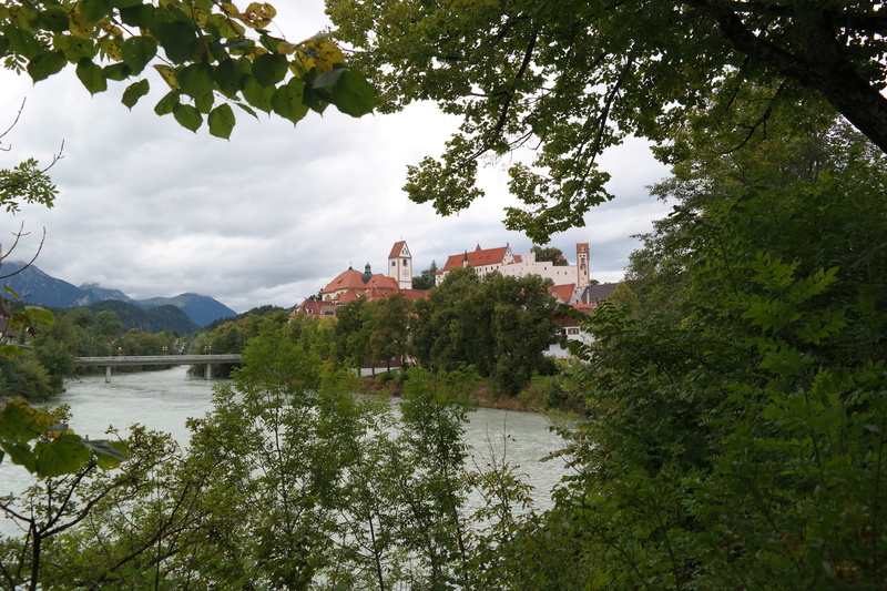 castle, medieval, sky, outdoors, green color, st mang abbey, built structure, beauty in nature, building, tree, day, high castle, river, building exterior