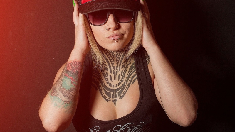 women, hat, beautiful woman, cool attitude, front view, one person, adult, studio shot, tattoo, headshot, indoors, black background, Teya Salat, blonde