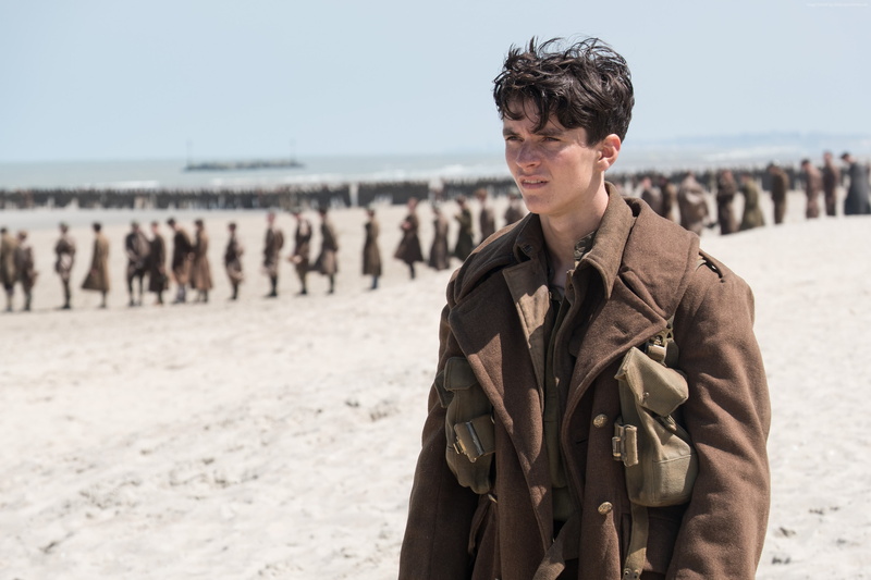 focus on foreground, waist up, Dunkirk, sky, standing, real people, young adult, leisure activity, beach, day, young men, sea, Fionn Whitehead, lifestyles