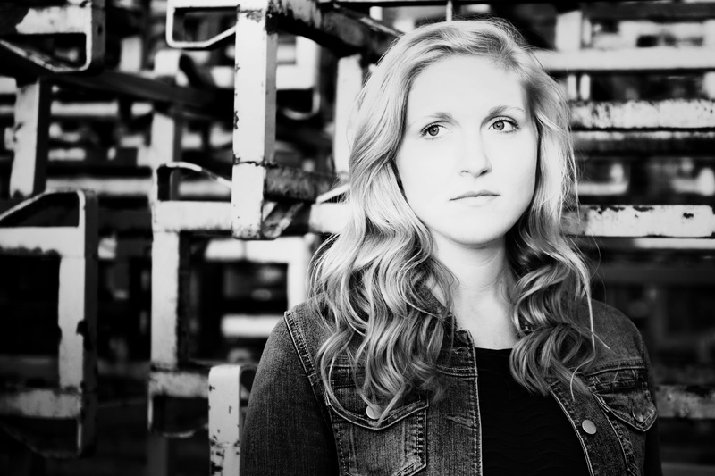 real people, grayscale, young adult, hairstyle, woman, female, blond hair, casual clothing, one person, gray, women, person, girl, standing, photography