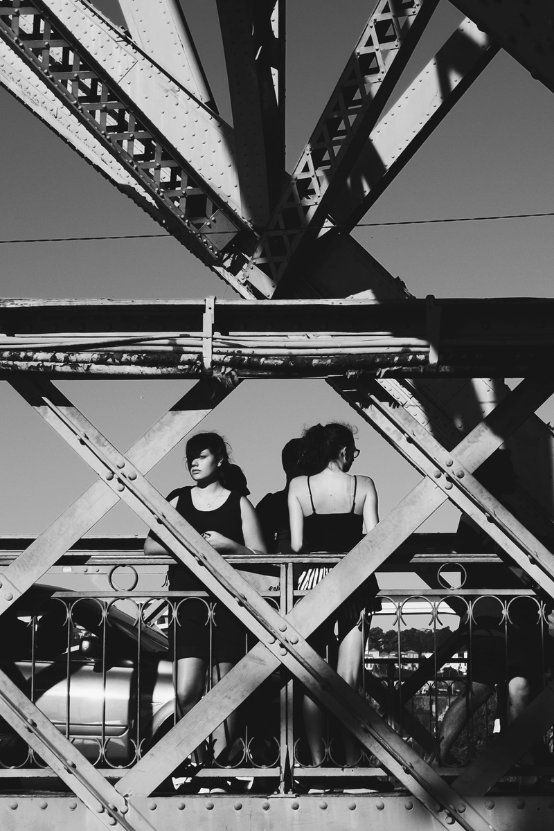 bridge, woman, iron, leisure activity, adult, vehicle, real people, group of people, steel, men, low angle view, connection, black and white, standing
