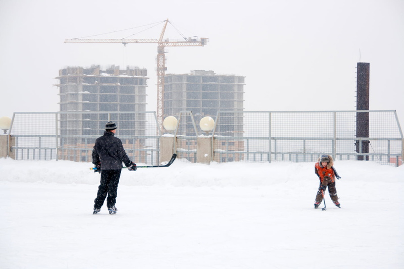 building, day, people, snowing, fun, skating, full length, nature, child, leisure activity, warm clothing, activity, young, little, kid, clothing, skater