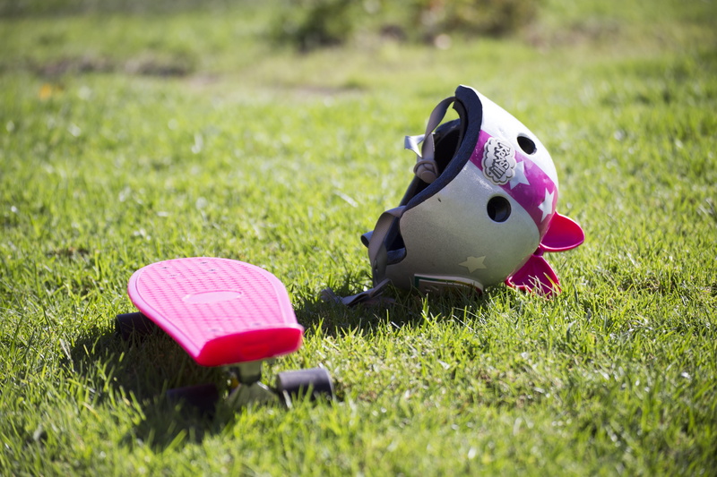 selective focus, close-up, active, childhood, field, skate, fun, young, absence, city, nature, recreation, grass, equipment, safety, playing, plant, child