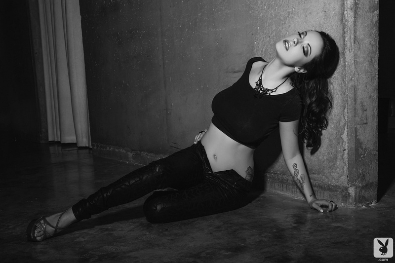 model, Elizabeth Marxs, wall, monochrome, long hair, high heels, on the floor, tattoo, Playboy, sitting, brunette, closed eyes, unbuttoned, black clothing