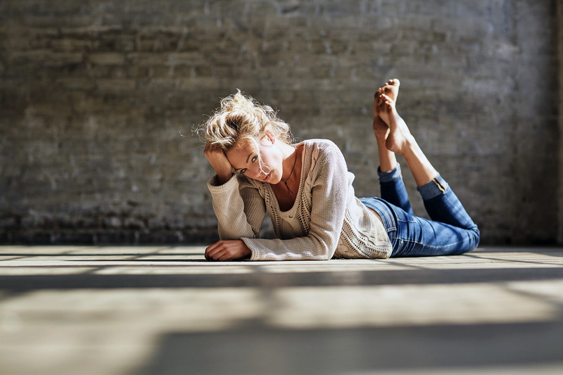 photo, photographer, face, sweater, looking at camera, lips, portrait, blonde, looking at viewer, long hair, depth of field, girl, pants, on the floor