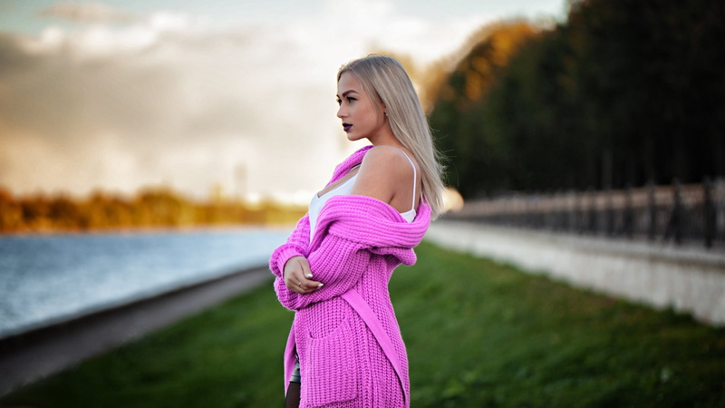 casual clothing, pink sweater, side view, young adult, model, clothing, blonde, dark lipstick, platinum blonde, white nails, one person, profile, three quarter length