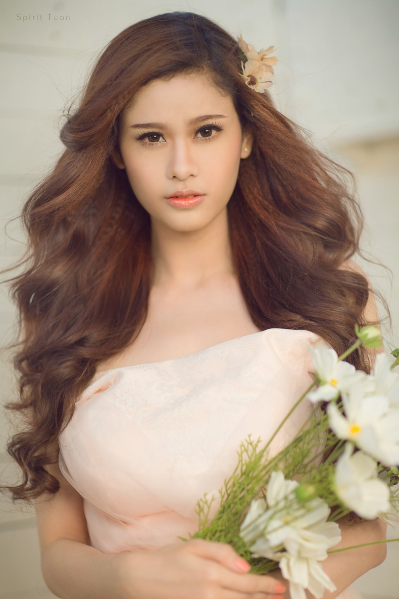 plant, beautiful woman, 1080P, long eyelashes, teenager, front view, looking at viewer, flower in hair, adult, long hair, beautiful people, brunette, eyeliner