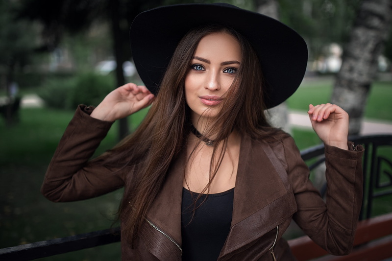 portrait, leather jackets, smiling, women with hats, black tops, looking at viewer, long hair, women outdoors, Veronika Avdeeva, brown jacket, depth of field