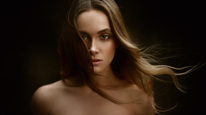 face, 1080P, looking at viewer, hair in face, model, indoors, long hair, Kseniya Klimenko, bare shoulders, dark background, brunette, Georgy Chernyadyev
