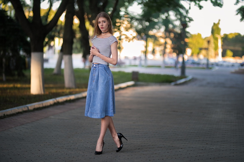 model, standing, outdoors, women outdoors, necklace, brown eyes, heels, 1080P, striped tops, Dmitry Shulgin, trees, depth of field, denim, skirt, belly