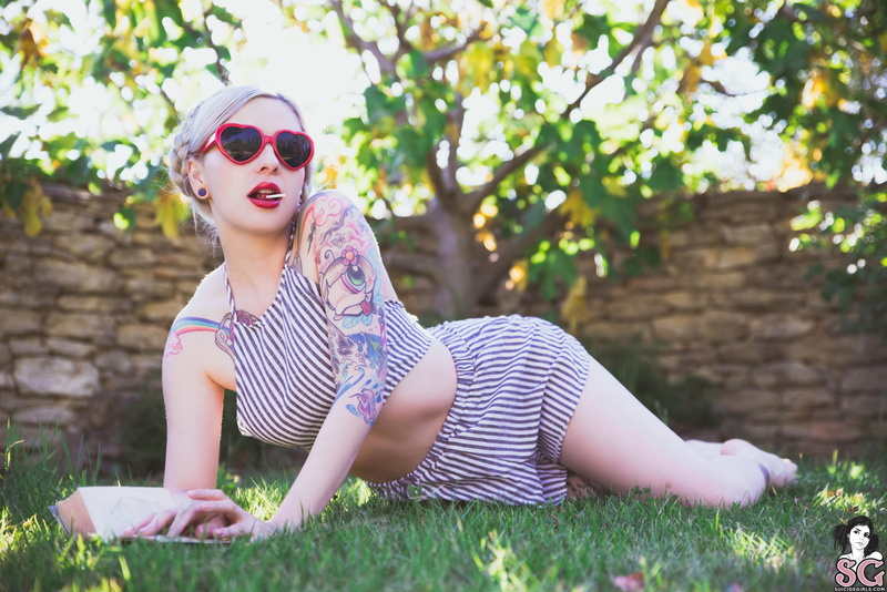 red lipstick, Marlene Suicide, sunglasses, lollipop, model, short shorts, striped clothing, grass, garden, braided hair, arm support, books, tattoo, 2K