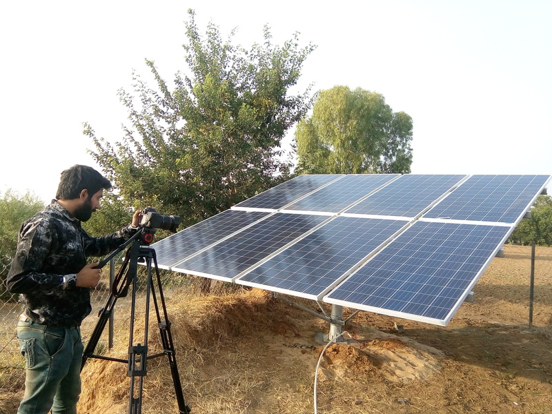people, leisure activity, Video, alternative Energy, day, solar Panel, recycling, camera, equipment, shooting, production, fuel and Power Generation, men