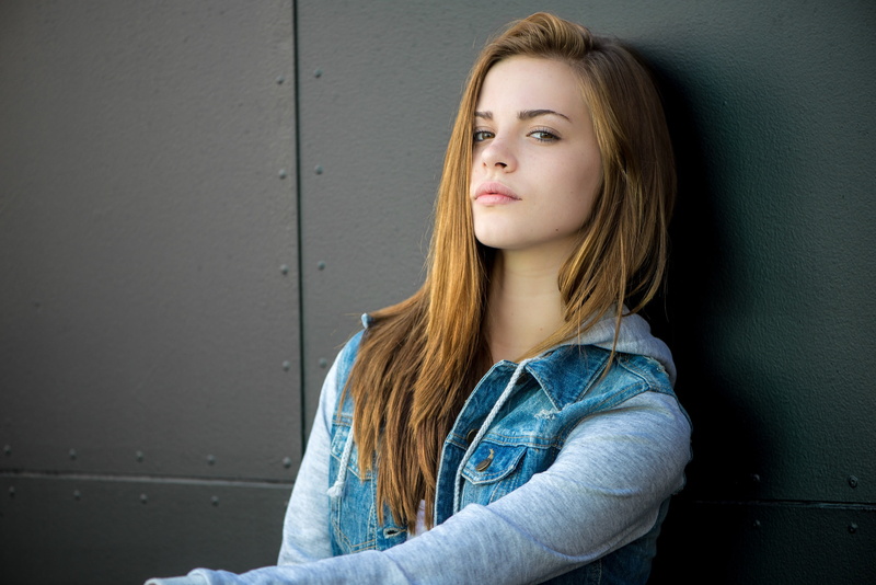 hair, young women, one person, contemplation, wall - building feature, denim, young adult, teenager, face, women, long hair, hairstyle, casual clothing