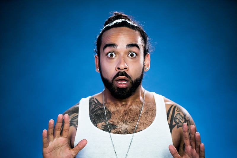 tattooed, black hair, Portraits, headshot, colored background, Emotion, human body part, young adult, portrait, Tattoo, Surprise, front view, blue, adult