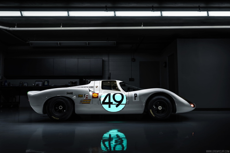 no people, number, motor racing track, transportation, motor vehicle, sports car, gray, luxury, wheel, car, land vehicle, architecture, dark, race cars