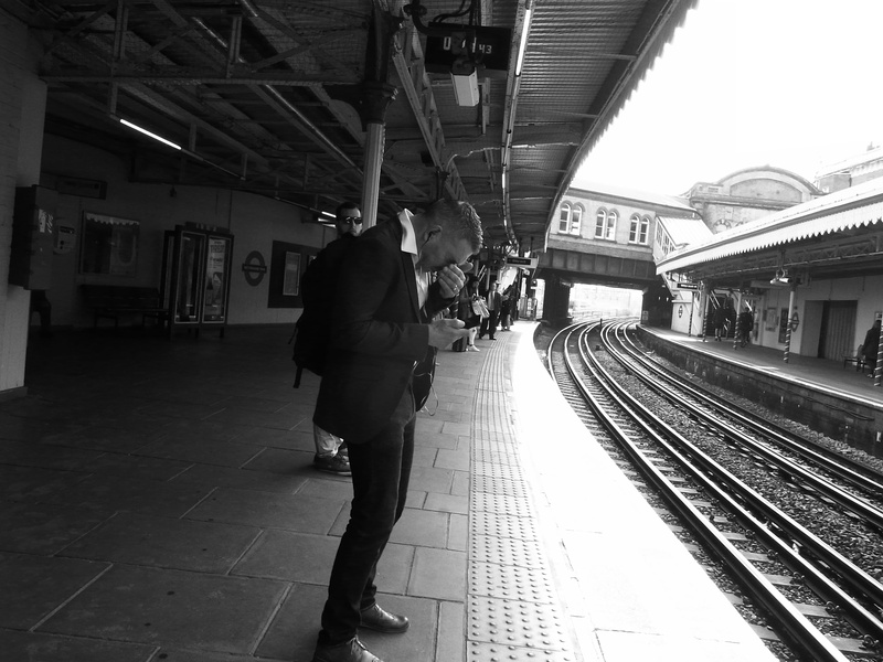 full length, railroad track, people, rear view, 2K, women, black and white, platform, lifestyles, rail transportation, architecture, railroad station platform