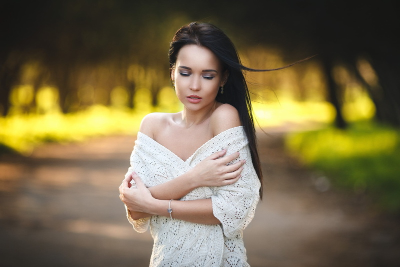 real people, looking at camera, tree, fashion, long hair, beautiful woman, Angelina Petrova, beauty, lifestyles, closed eyes, portrait, focus on foreground