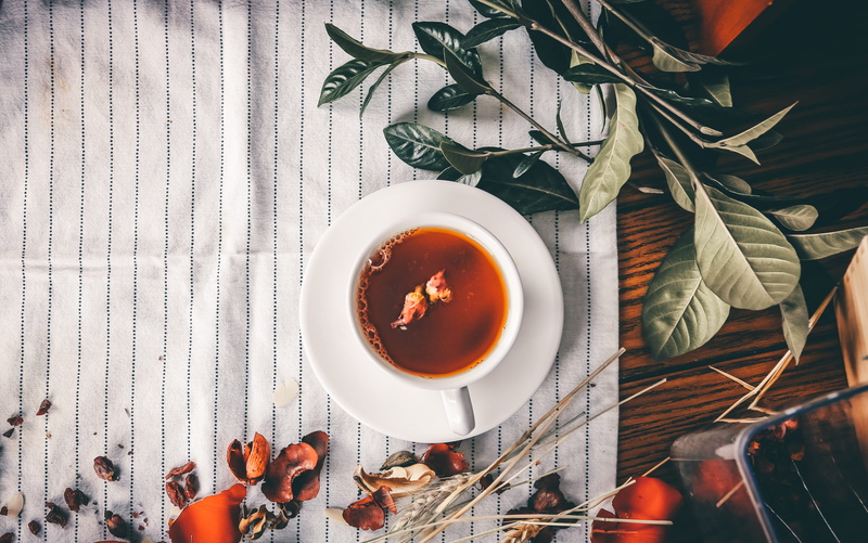 food, tea cup, refreshment, food and drink, leaves, spoon, liquid, hommade, rose, cloth, saucer, still life, home, beverage, aerial, rose tea, herb, freshness