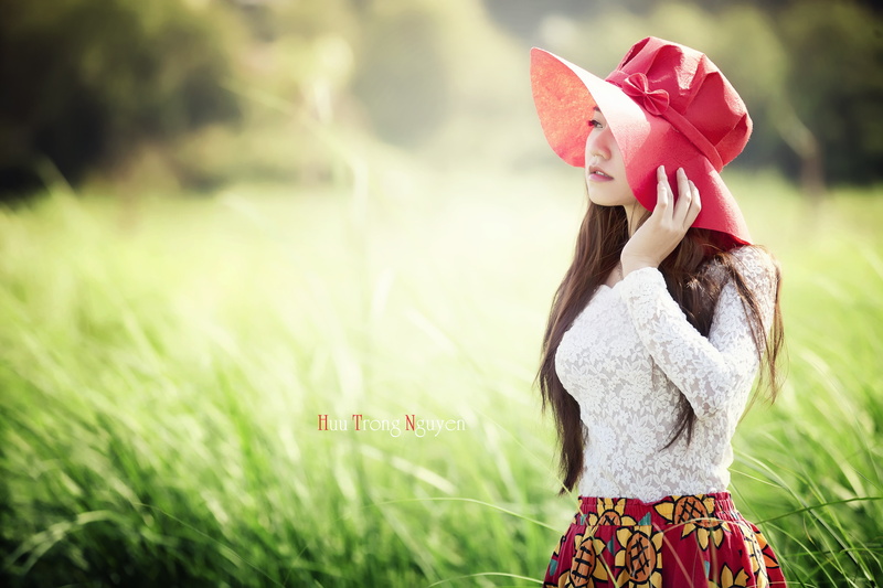 portrait, standing, real people, millinery, beautiful woman, obscured face, day, long hair, young adult, outdoors, one person, plant, beauty in nature