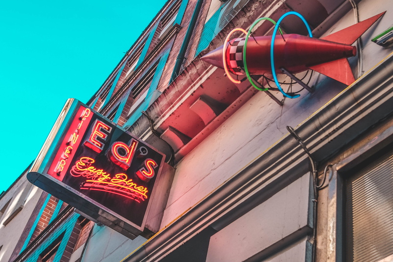 building exterior, communication, luminou, lighting equipment, red, signage, outdoors, sky, color, text, warm, looking up, built structure, western script