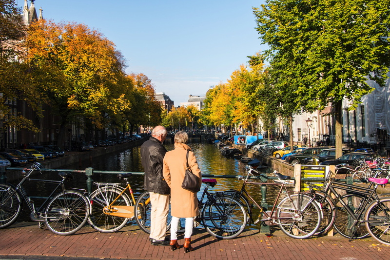 tree, building exterior, canal, outdoors, plant, sky, Netherlands, water, full length, land vehicle, women, built structure, couple, transportation, day
