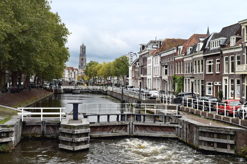 canal, city, outdoors, building exterior, netherlands, nautical vessel, built structure, houses, tower, 5K, mode of transportation, trees, flowing water