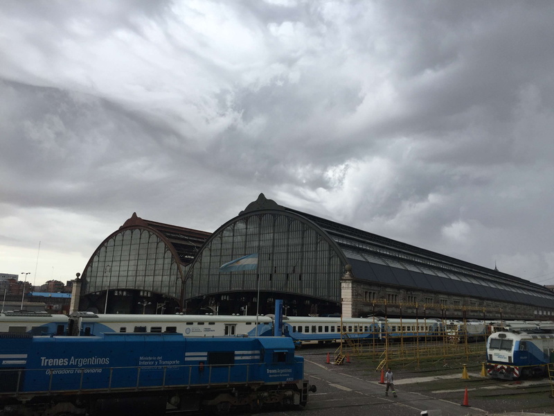 railway station, airport, building exterior, mode of transportation, land vehicle, travel, airport terminal, no people, air vehicle, overcast, retiro, built structure