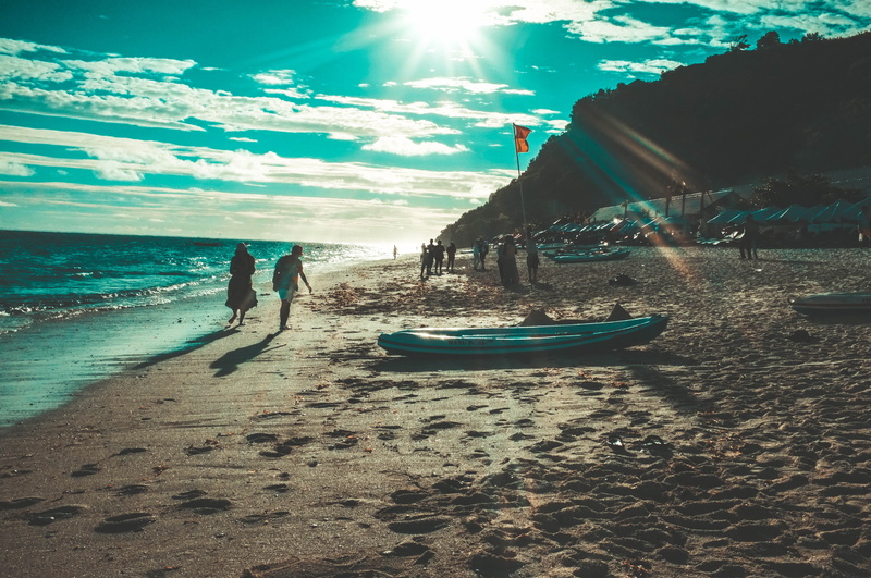 water, lifestyles, people, horizon over water, leisure activity, boat, pandawa beach, cloud - sky, beach, incidental people, vacations, cloud, walking