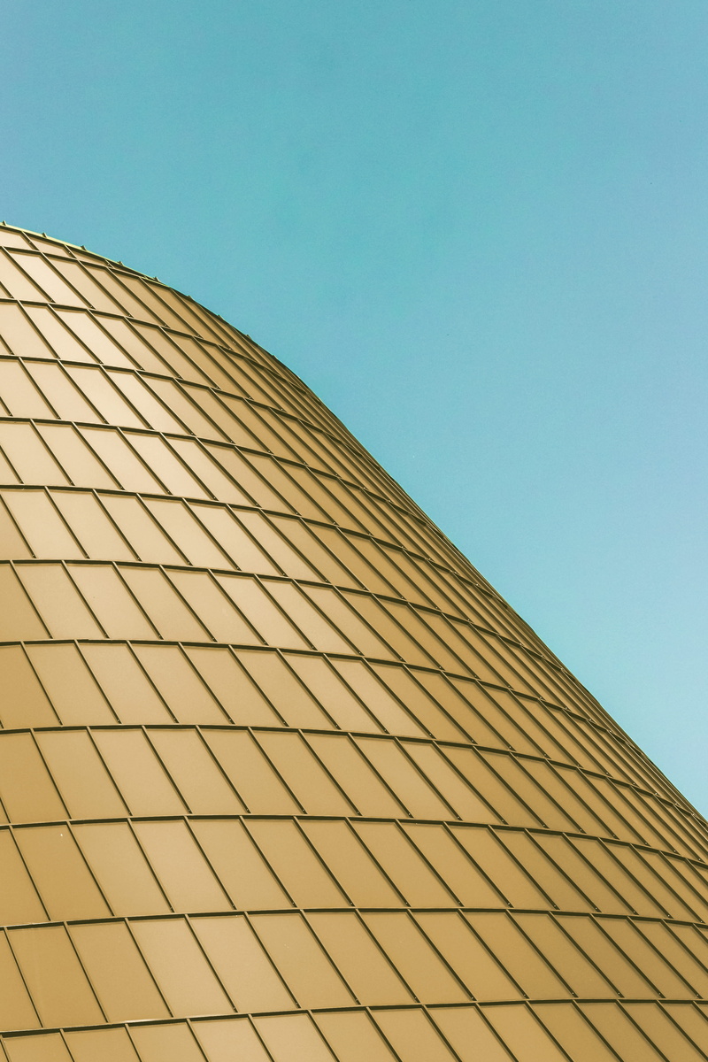 built structure, glass, clear sky, photography, roof, building, outdoors, architecture, building exterior, sky, architectural, skyscraper, curve, no people