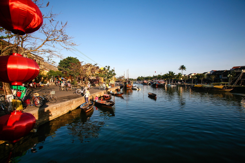 clear sky, group of people, nature, lantern, sky, travel destinations, lantern festival, outdoors, holiday, lake, incidental people, plant, hoi an lantern