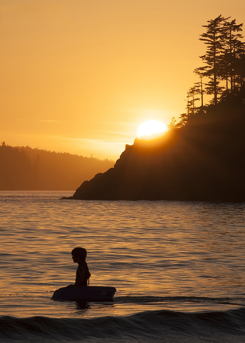 orange color, water, silhouette, sunset, lake, tranquil scene, lifestyles, sunlight, scenics - nature, 2K, nature, idyllic, tofino, non-urban scene, beauty in nature