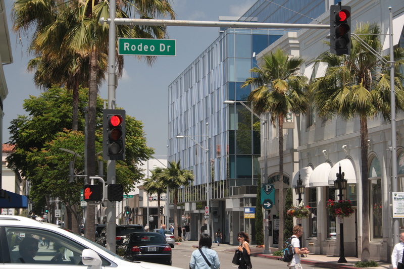 beverly hills, car, motor vehicle, city, incidental people, plant, road, tree, rodeo drive, street, architecture, built structure, sign, transportation
