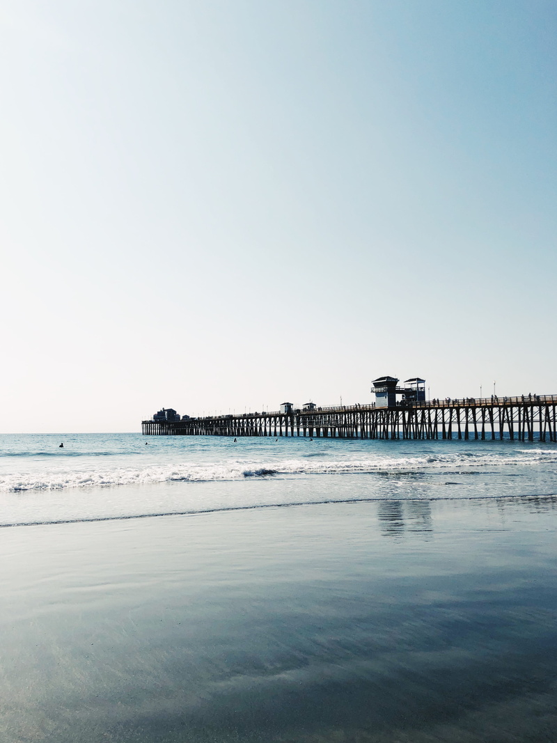 tranquil scene, building, sea, wooden, outdoors, waterfront, bridge, no people, nature, tranquility, clear sky, architecture, beauty in nature, boardwalk