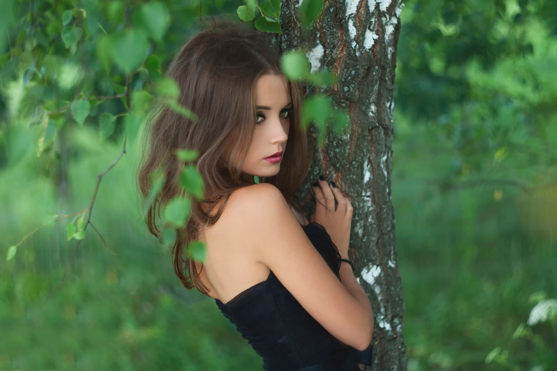 top, adult, land, young adult, young women, long hair, hair, strapless, plant, outdoors, leisure activity, one person, lifestyles, birch, beautiful woman