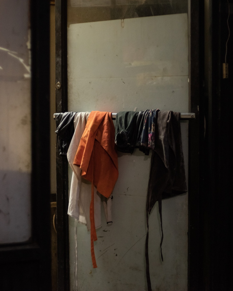 architecture, srick, coathanger, grungy, overcoat, color, usa, clothing, wall - building feature, cleaning, apparel, robe, rack, built structure, still life