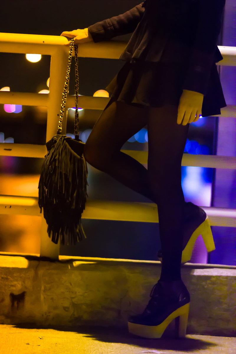 lifestyles, fashion legs, focus on foreground, adult, indoors, low section, blue bridge, human body part, 5K, lady, united states, night time, illuminated