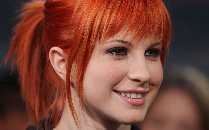 bangs, beauty, 1080P, teeth, happiness, hair, close-up, toothy smile, young adult, dyed red hair, looking at camera, green eyes, body part, headshot, portrait