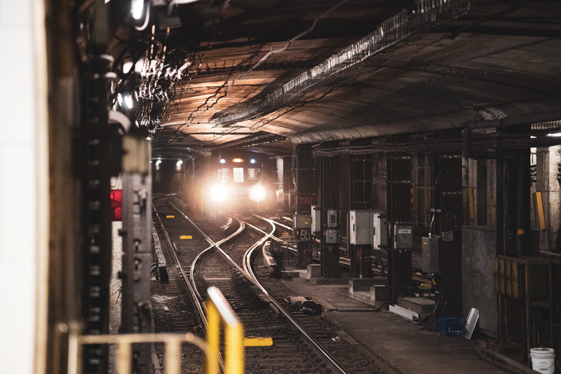 terminal, train track, corridor, pergola, travel, mode of transportation, light, train, shipping container, illuminated, subway, indoors, porch, architecture